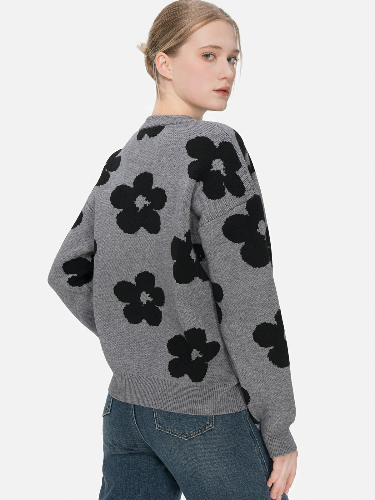 Embrace natural grace with a gray floral-print sweater in a loose and comfortable fit