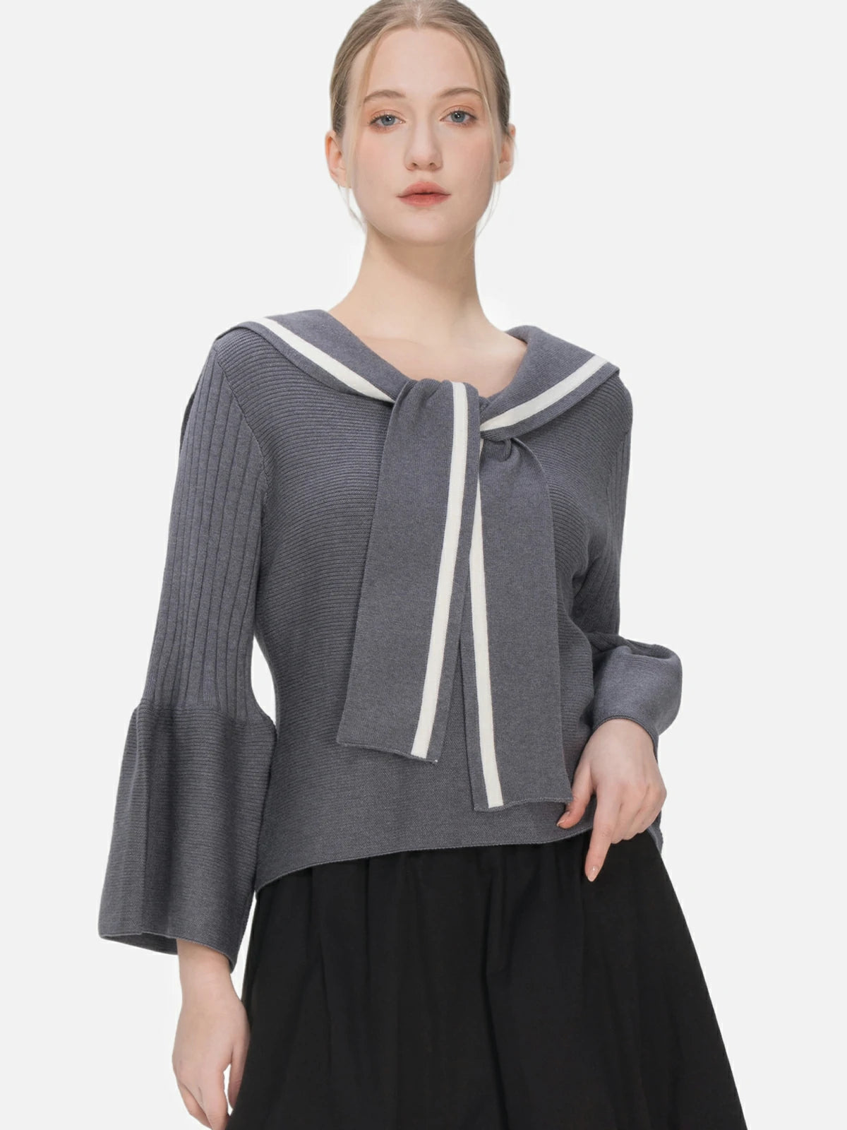 Elevate your style with this gray sweater featuring a navy collar and trumpet sleeves, embodying classic elegance and tasteful fashion for various occasions.