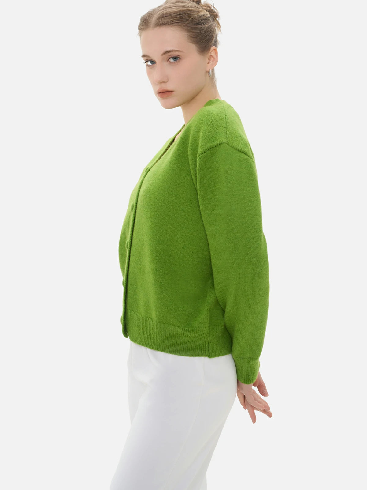 Warm and soft material in a stylish green cardigan outerwear.