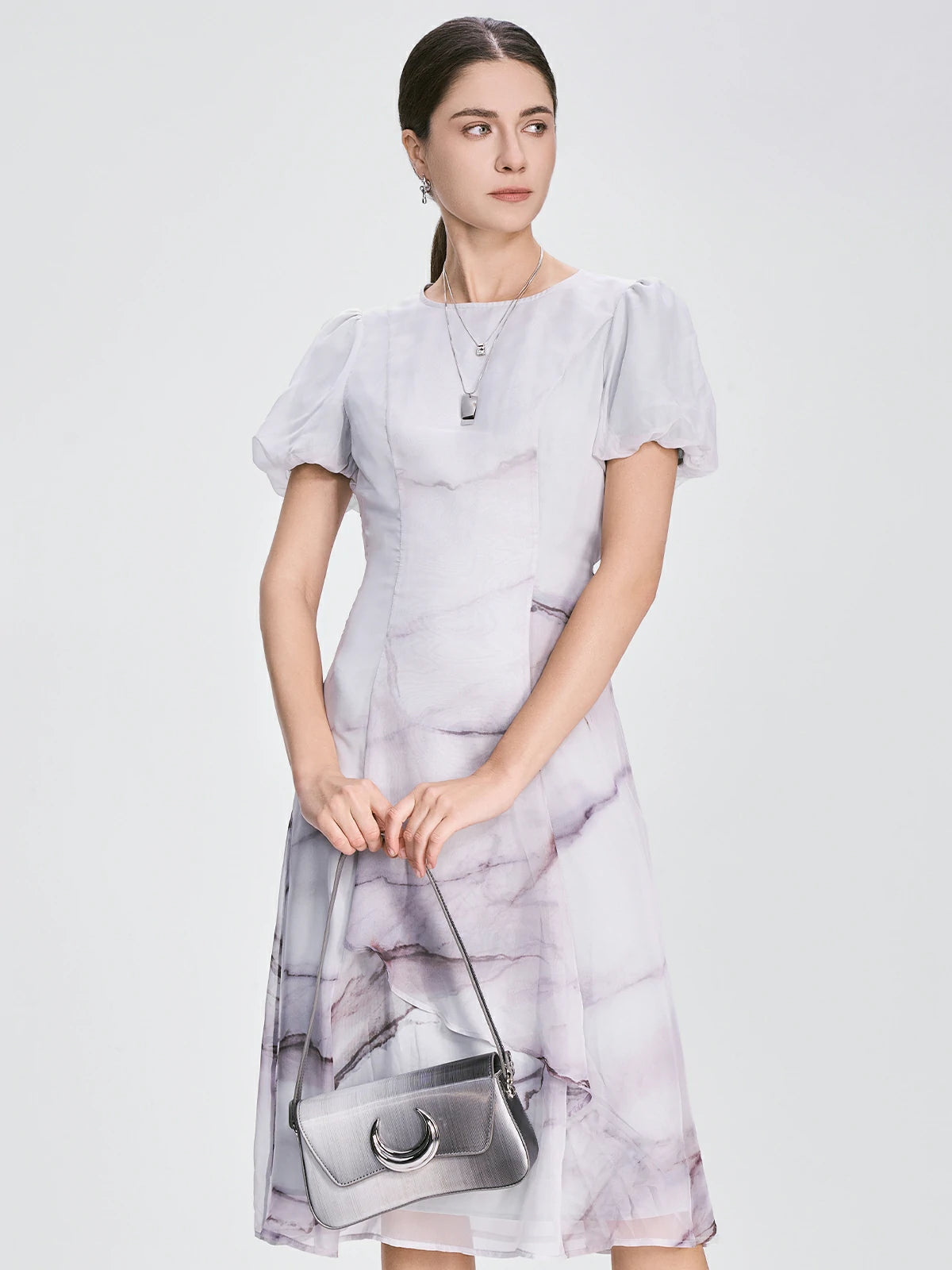 marble-print midi dress with soft neutral tones and an artistic flow