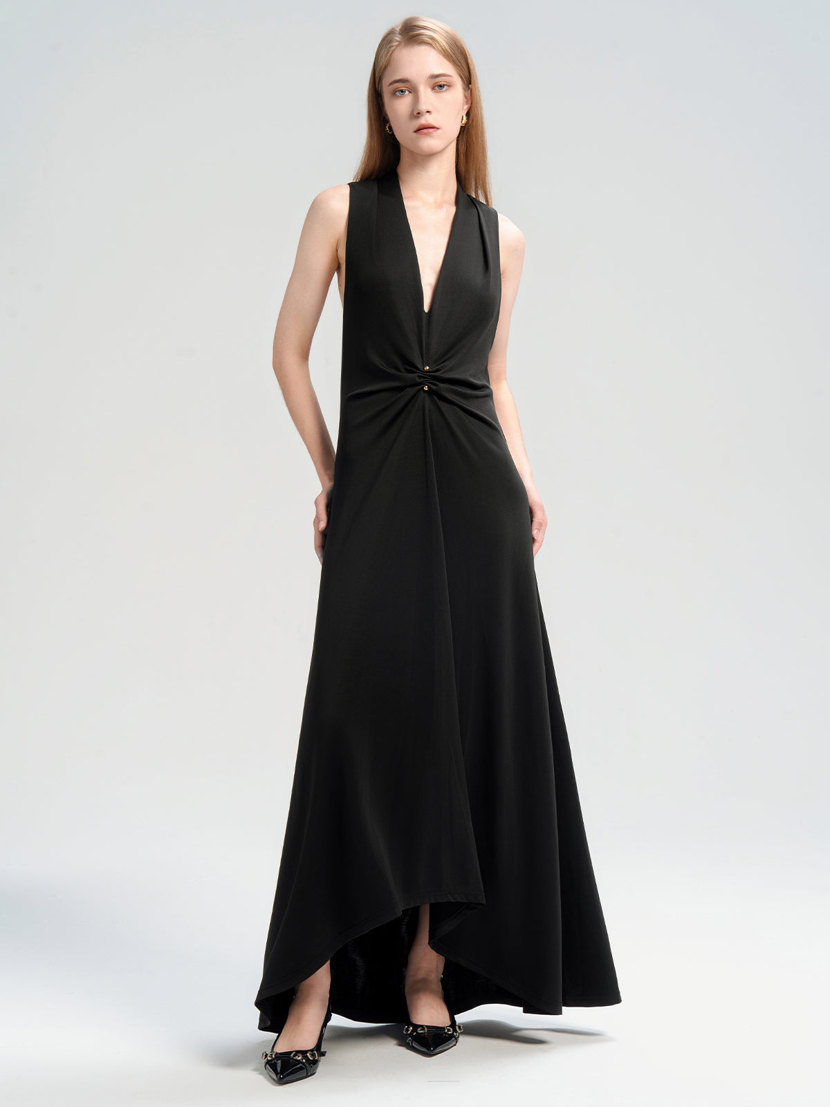 S·DEER sleeveless halter neck maxi dress, showcasing its elegant design with an high-low hem