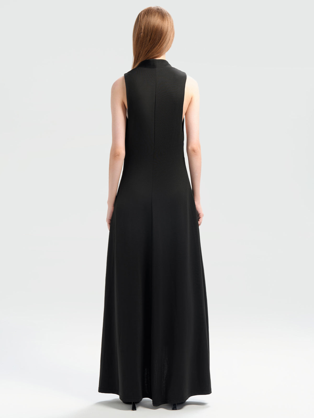 S·DEER deep v-neck sleeveless maxi dress with high-low hem, perfect for evening events or date nights