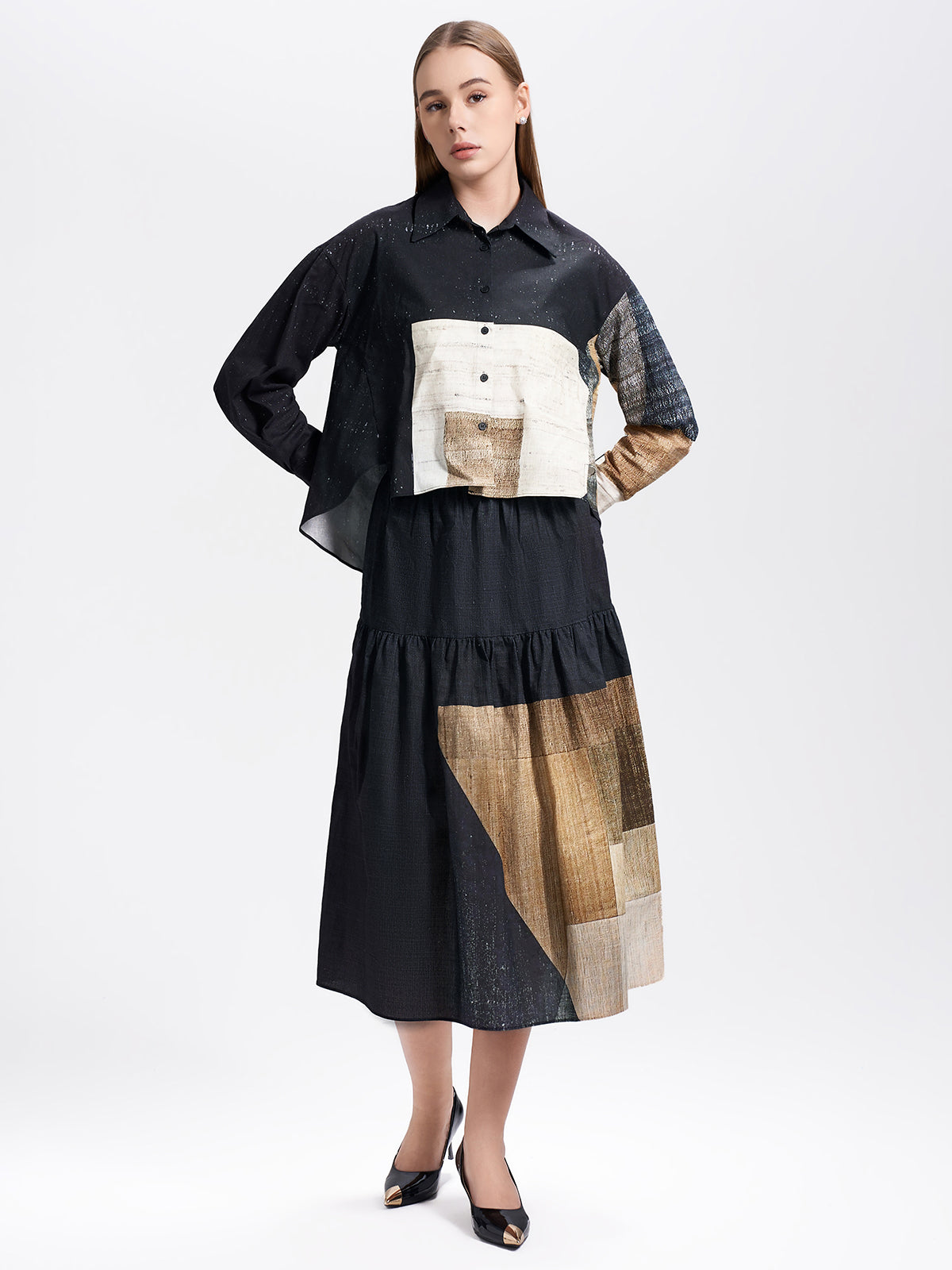 Unique color-block cropped blouse with long sleeves, crafted from textured fabric for a contemporary artistic look