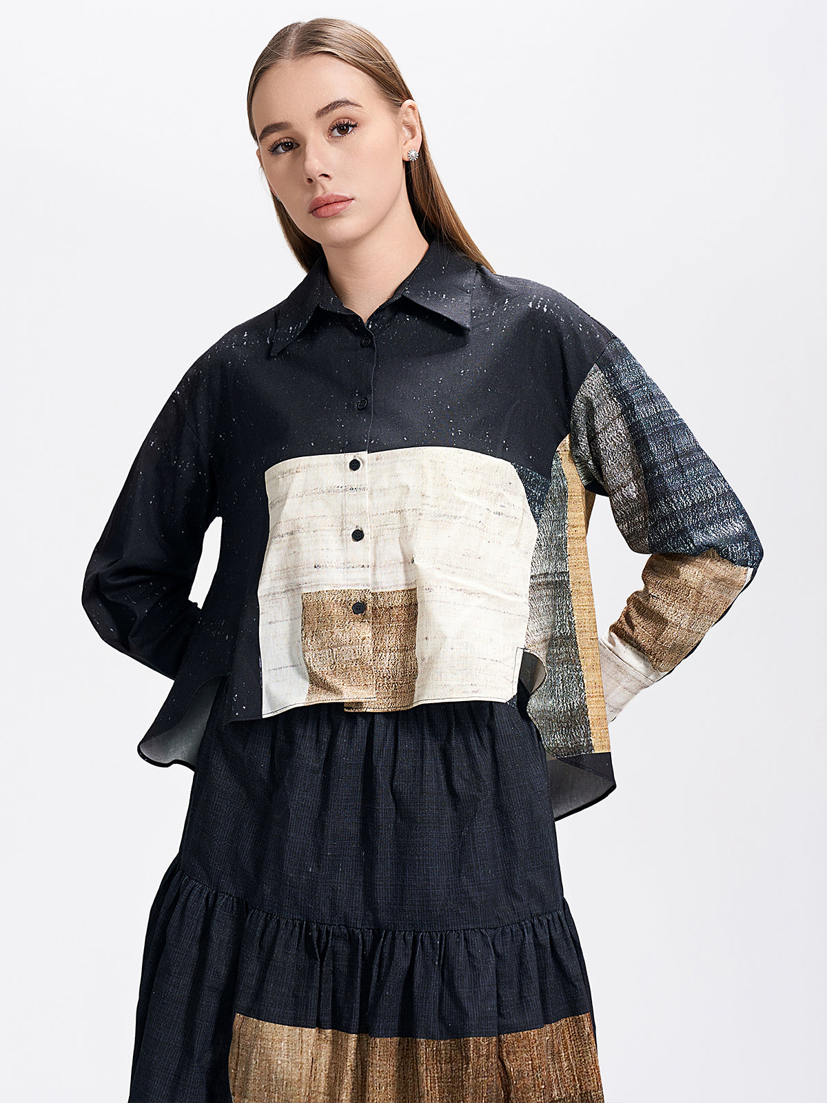 Unique color-block cropped blouse with long sleeves, crafted from textured fabric for a contemporary artistic look