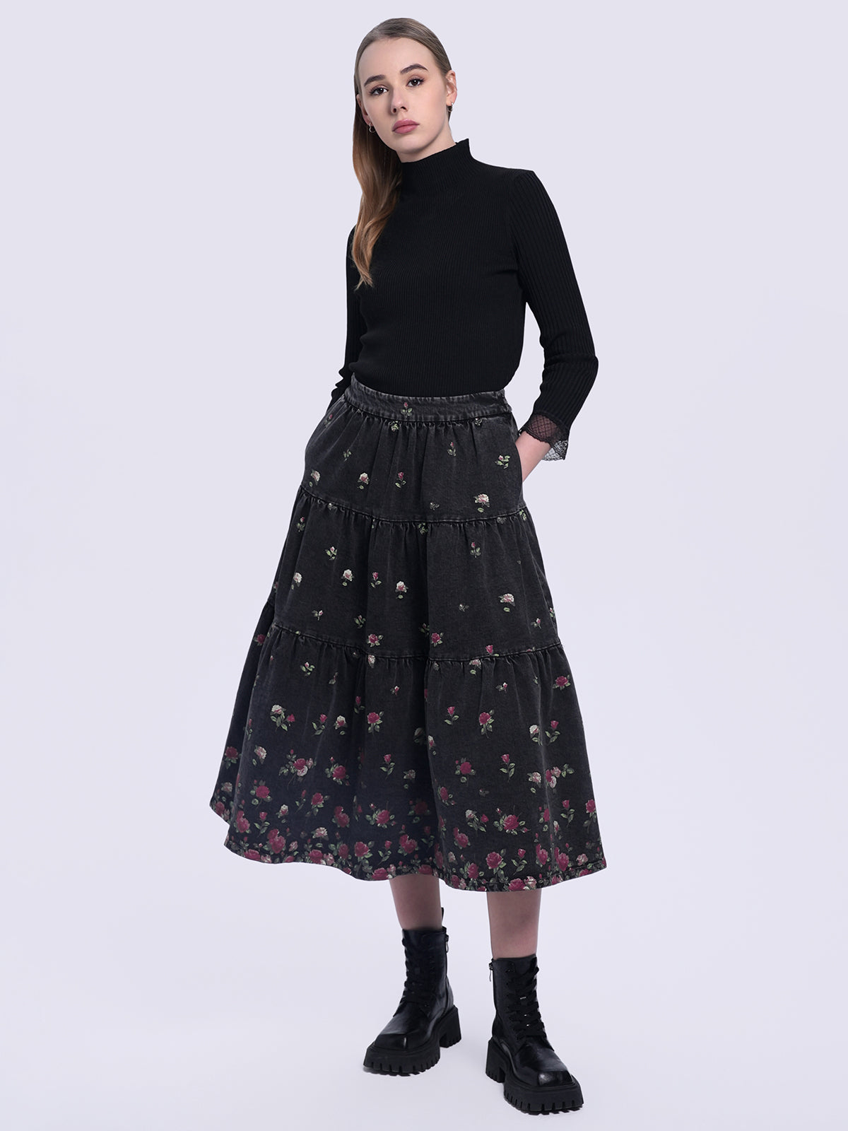 Chic black floral print cotton skirt with an elastic waistband and layered ruffles