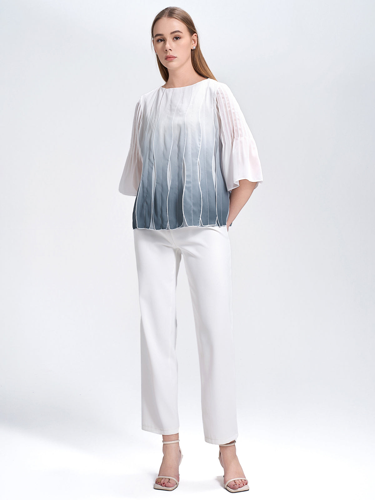 Women's lightweight chiffon blouse with an ombre fade effect, three-quarter sleeves, and a unique textured design