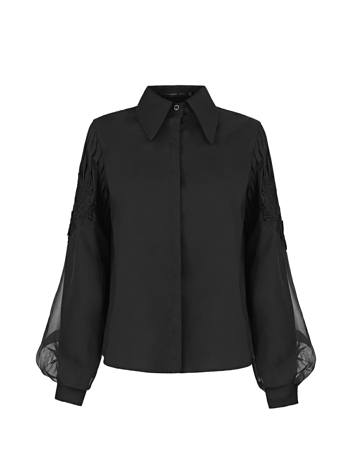Expressing personality through the stylish black shirt with pleated sleeves.