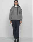 Sporty Serenity: Grey Hooded Sweatshirt with Off-Shoulder Detailing, Ideal for Active Lifestyles