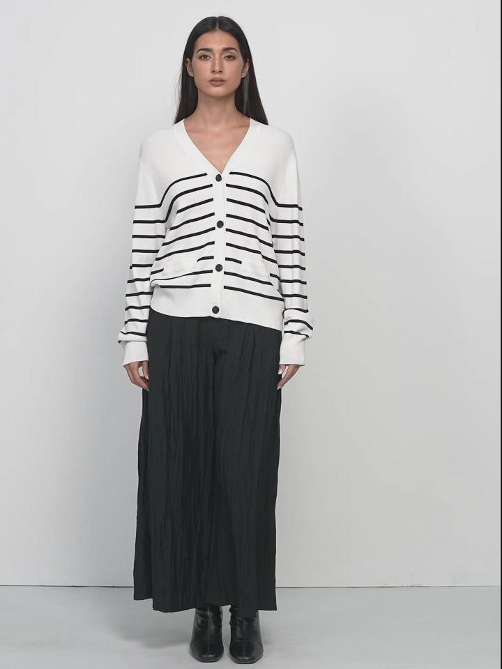 Wardrobe Staple: Make this V-neck striped knit cardigan a staple in your wardrobe for all occasions.