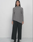Outstanding design, gray semi-turtleneck sweater with asymmetric hem