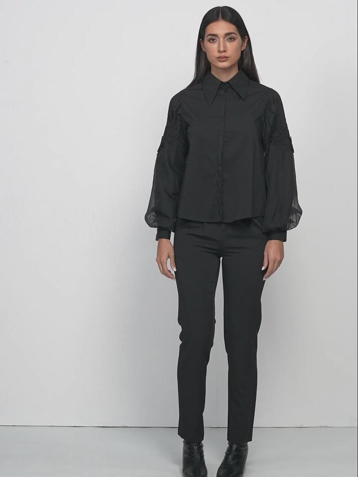 Elegant and expressive black shirt with lantern sleeves