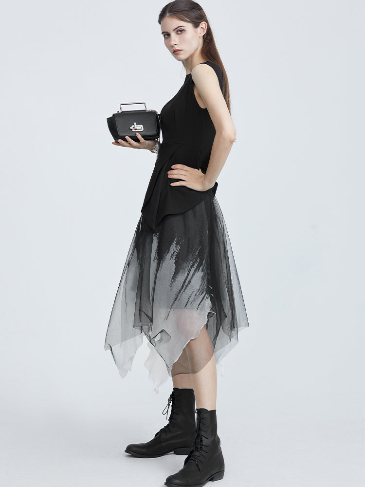 Side view of a Irregular sleeveless midi dress with tulle hem
