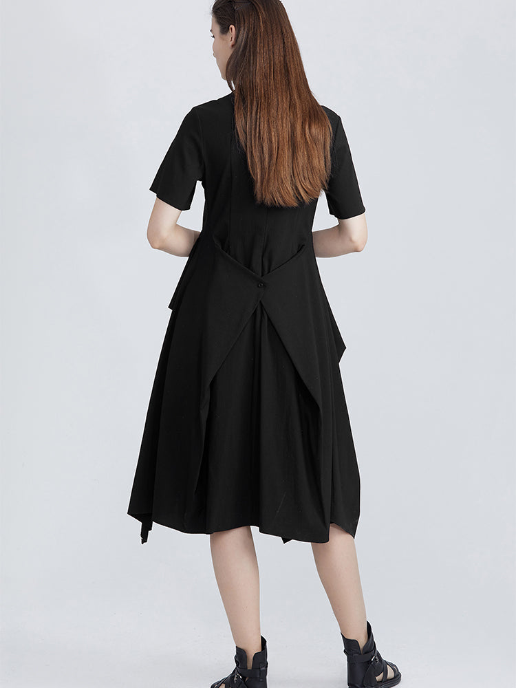 Back view of a sleek black dress with a minimalist silhouette and subtle zipper detail at the side
