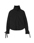 Pleated cuff tie-waist long-sleeve shirt adding a touch of elegance to women's ensembles